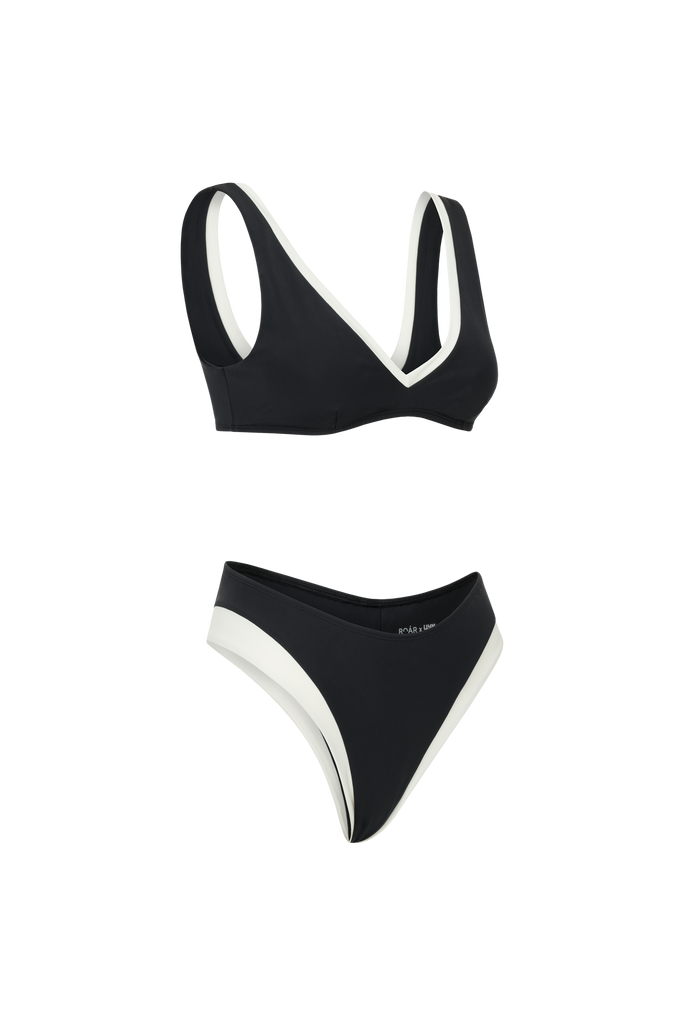 Smooth black swim top crafted for comfort, elegance, and versatility.