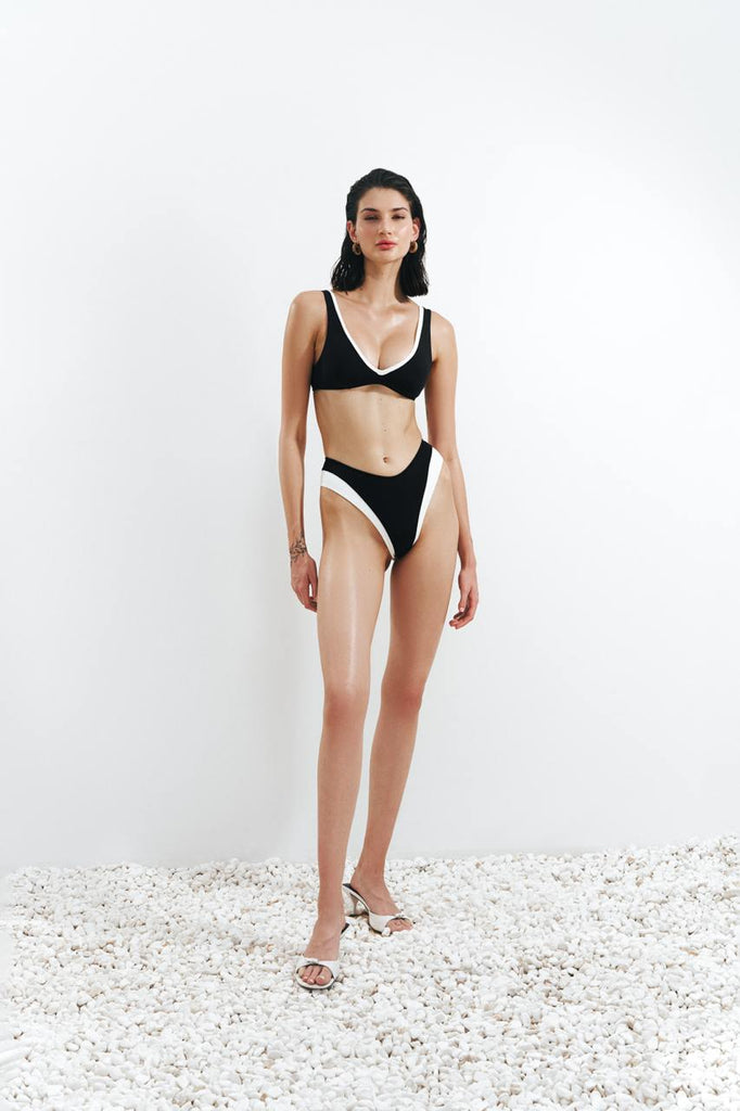 Minimal black bikini top designed for durability and long-lasting color.