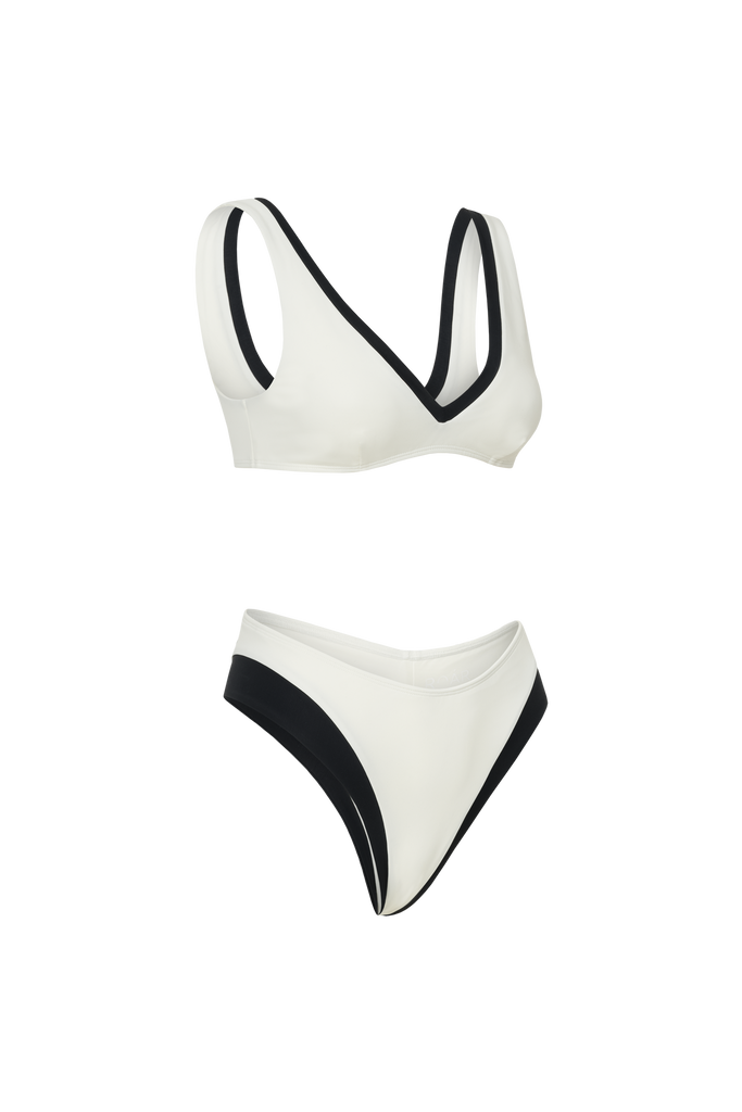 Smooth milk swim top providing comfort, stretch, and subtle sophistication.